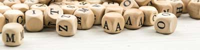 Buchstabenwuerfel1008b von Fiedels AdobeStock_217264070_Web